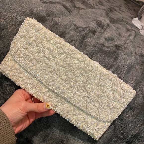 Plush Beige Clutch with Flap Closure and Textured Finish - Picture 2 of 7